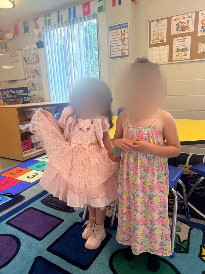 Dressed for the occasion at EduCastle Learning Center, faces blurred for privacy